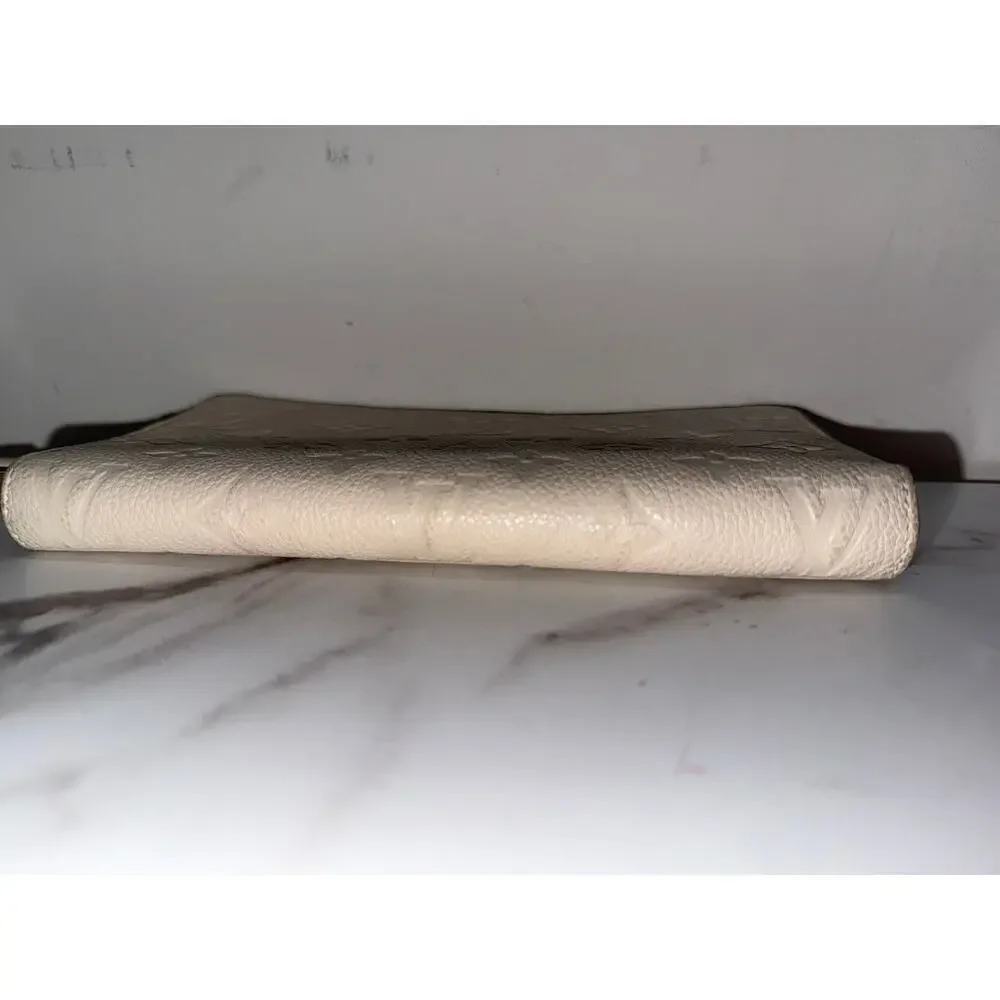 Louis Vuitton Zippy Wallet in Cream Empreinte Leather